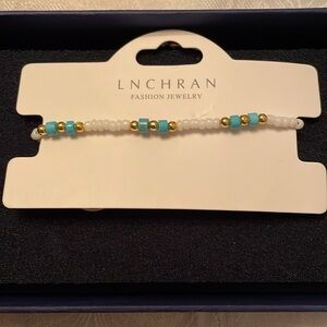 💥 $10 or 3 for $15💥 White and Turquoise Beaded Adjustable Bracelet NWT